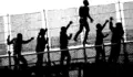 africans-climbing-fence-europe