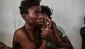 xTwo-Nigerian-refugees-cry-and-embrace-in-a-detention-centre-in-Surman-Libya-in-August-2016-Reuters-720x480.jpg.pagespeed.ic.yi-Ul7pM5c port