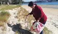 Ana Miranda limpeza praia port