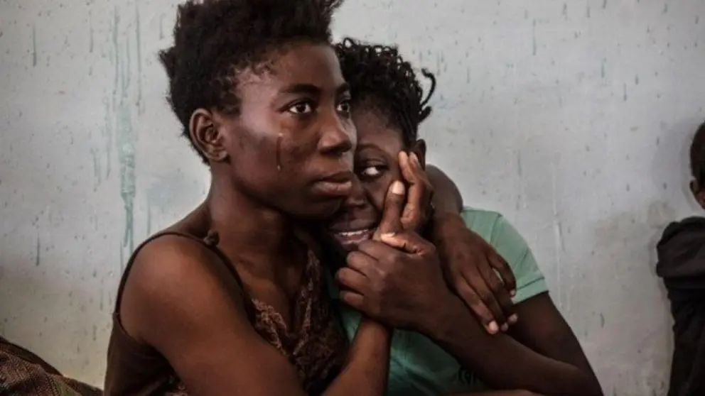 xTwo-Nigerian-refugees-cry-and-embrace-in-a-detention-centre-in-Surman-Libya-in-August-2016-Reuters-720x480.jpg.pagespeed.ic.yi-Ul7pM5c port